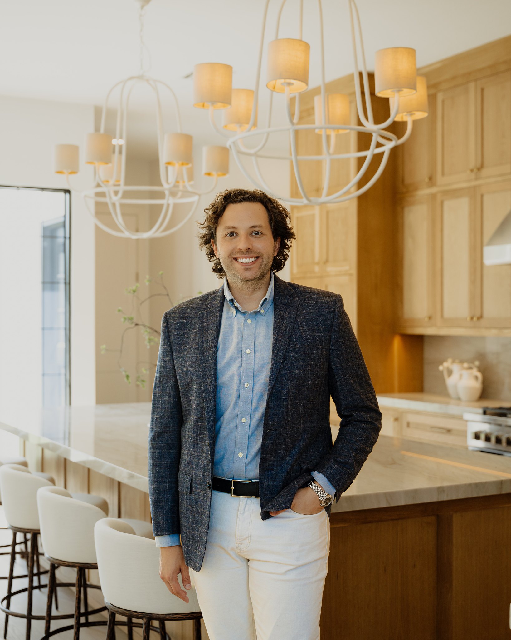 Ryan Writt, Founder and Principal of R+R Real Estate Development, in the kitchen of R+R Garden Oaks